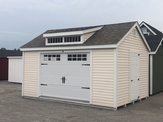 12x16 Vinyl Winchester with a garage door, and studio dormer