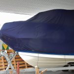 boat with a cover in a garage