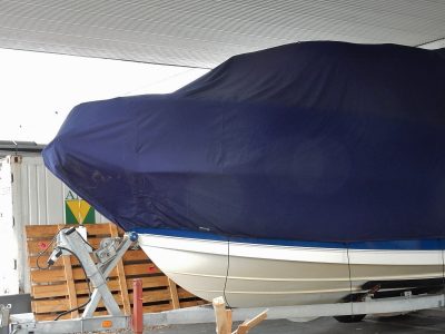 boat with a cover in a garage