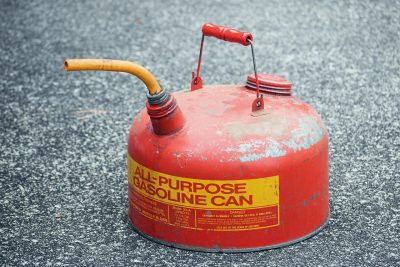 Red all purpose gasoline can for proper gasoline storage